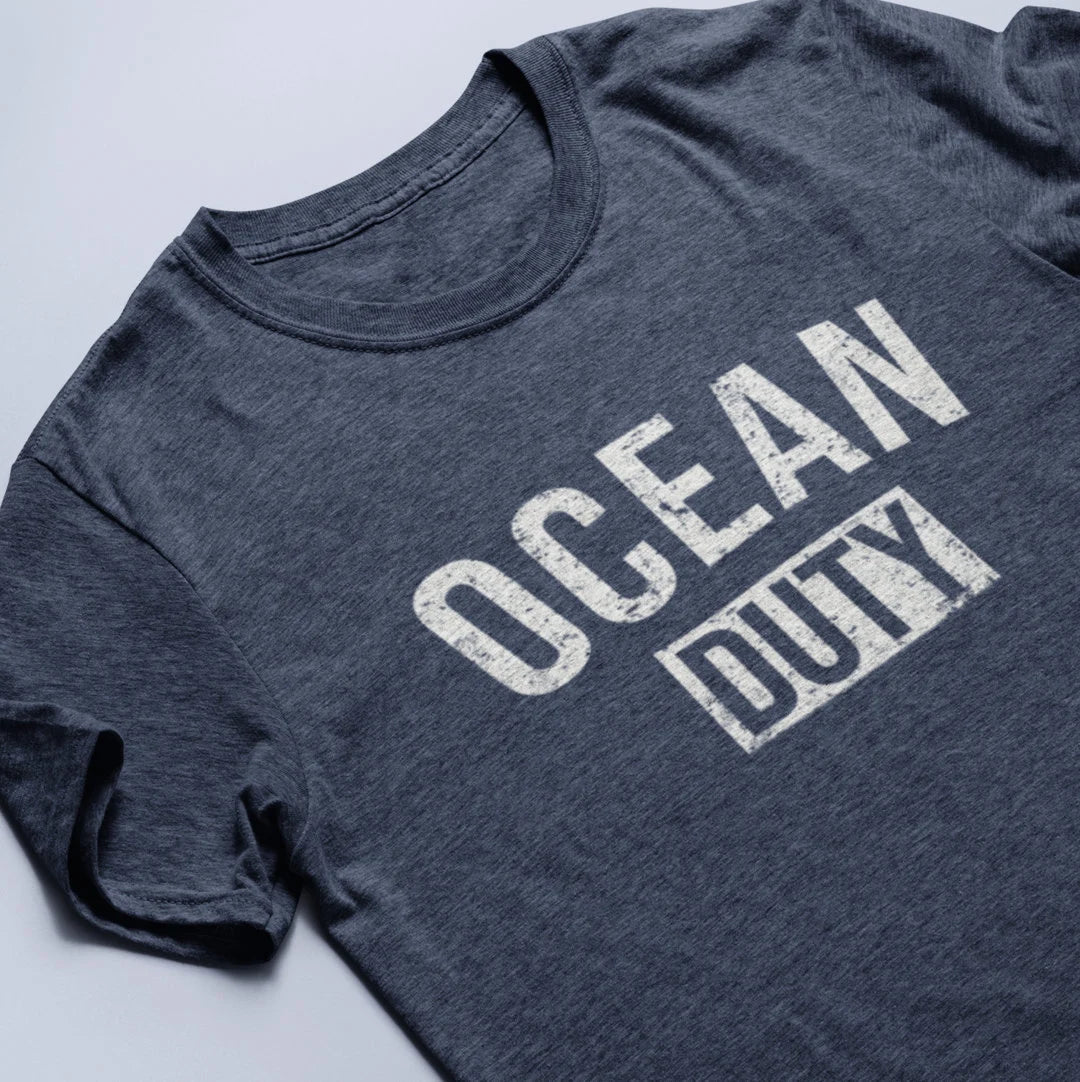 Blue t-shirt with distressed 'ocean duty' printed on the front.