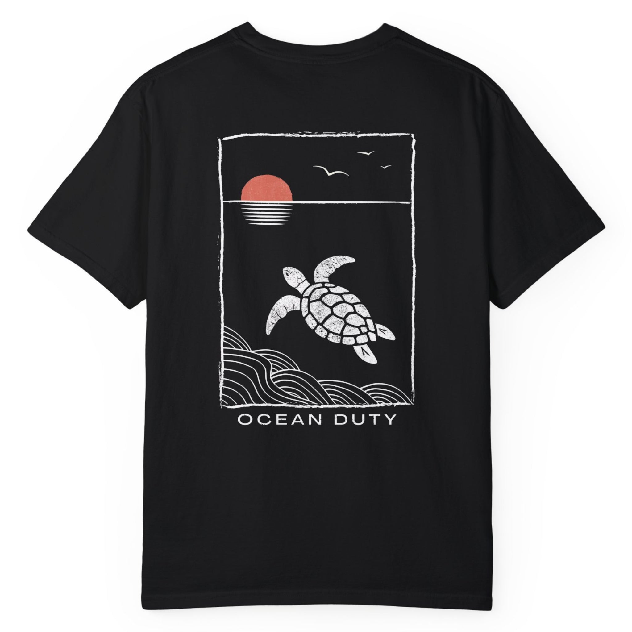 A hand drawn art print of  sea turtle on the back of a black t-shirt.