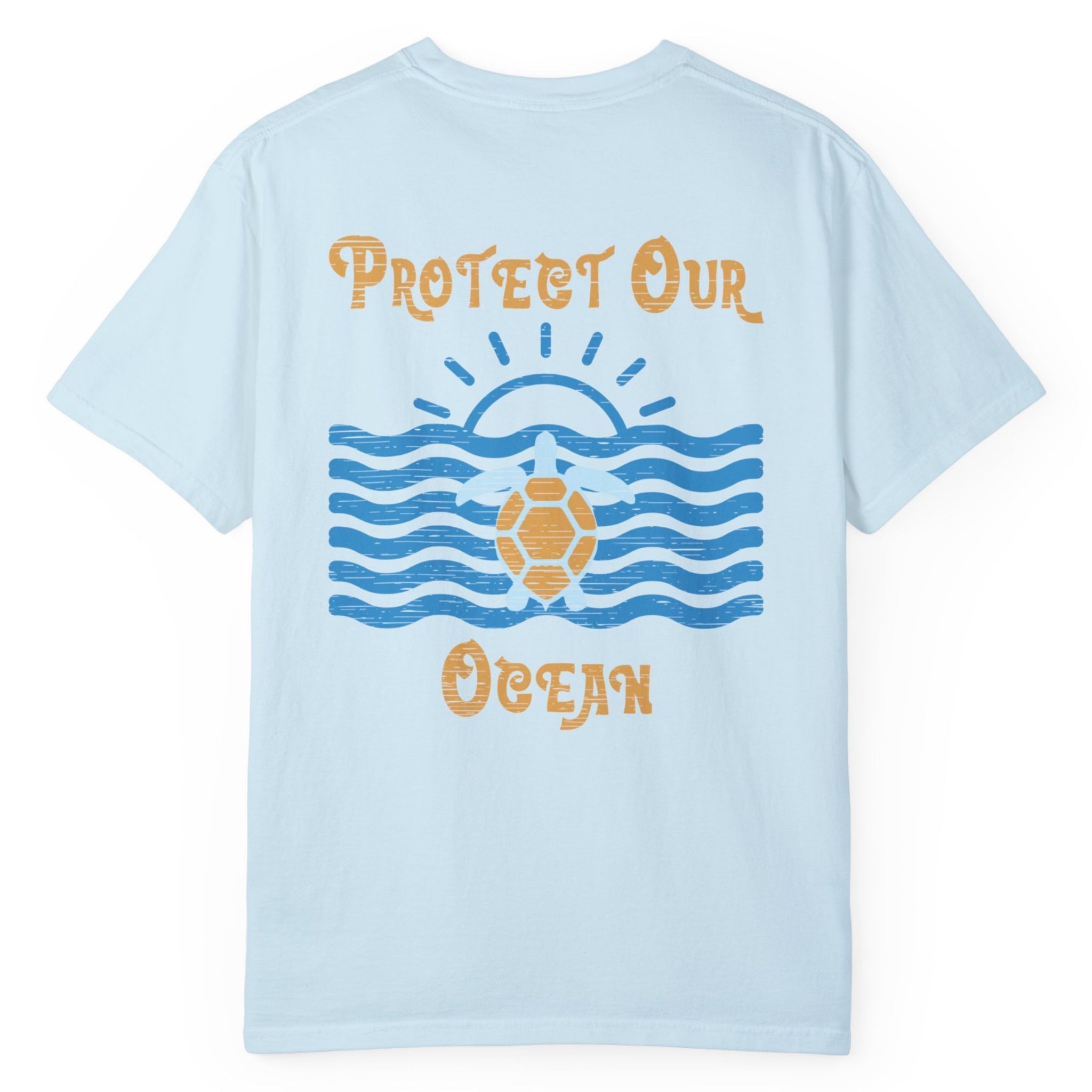 A blue T-shirt with a sea turtle and sun with the words 'protect our ocean.'