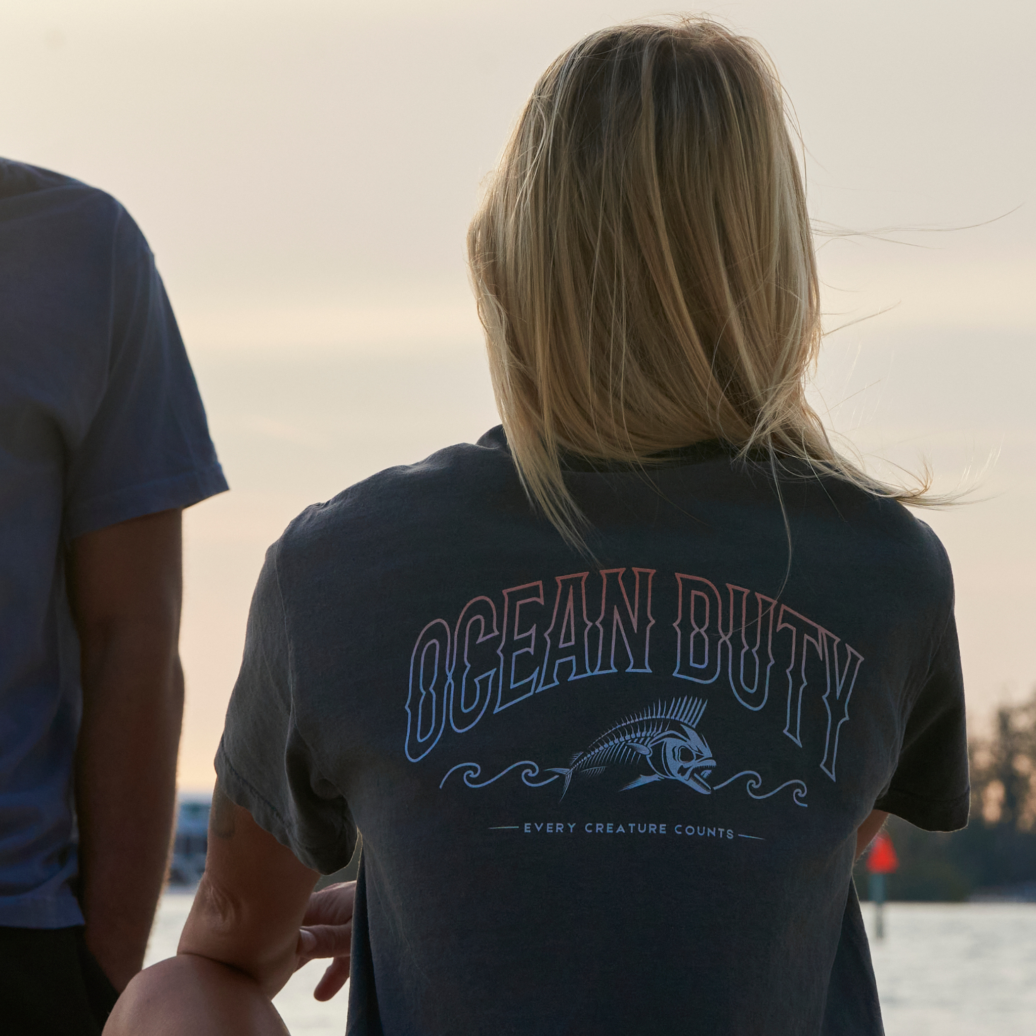The back of a black T-shirt from Ocean Duty about every marine creature being important.