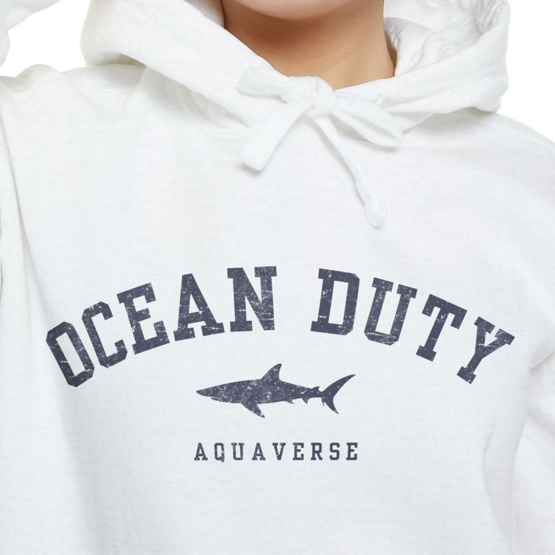 model in white hoodie with shark ocean print