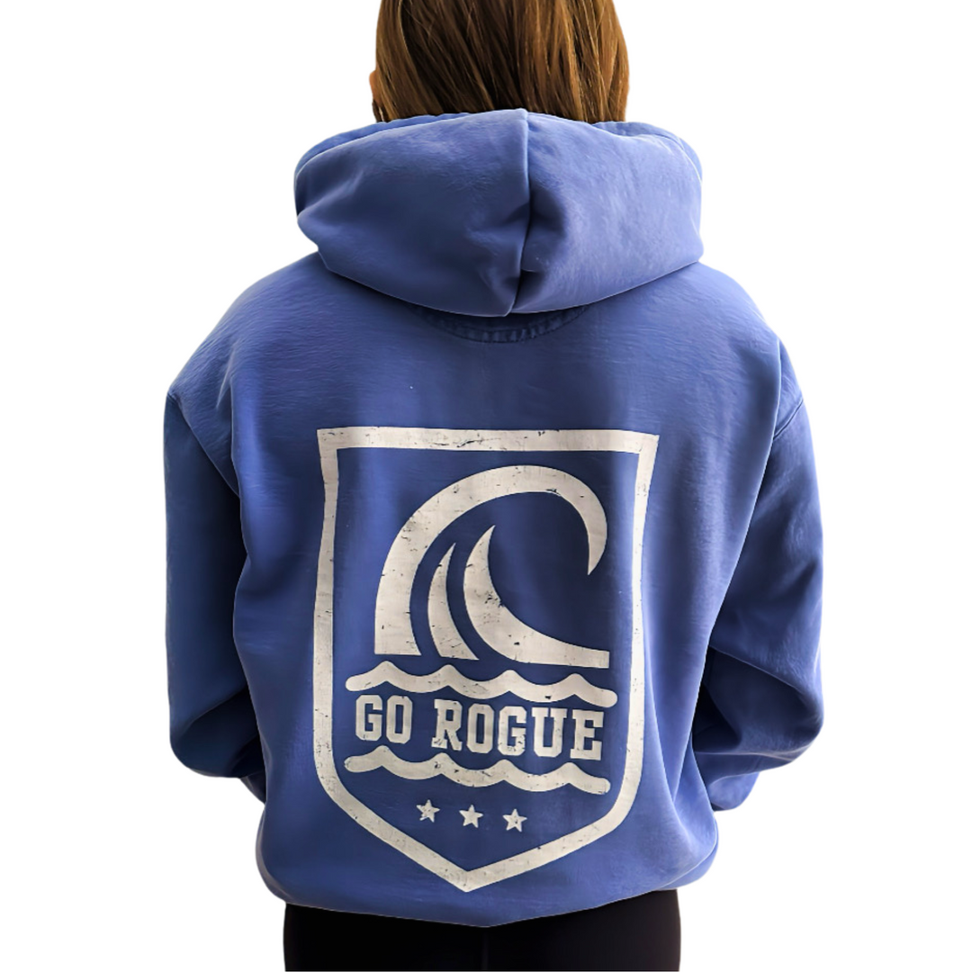 Girl wearing Ocean Duty Go Rogue Hoodie with wave on back