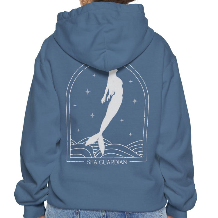 model wearing blue hoodie with mermaid print