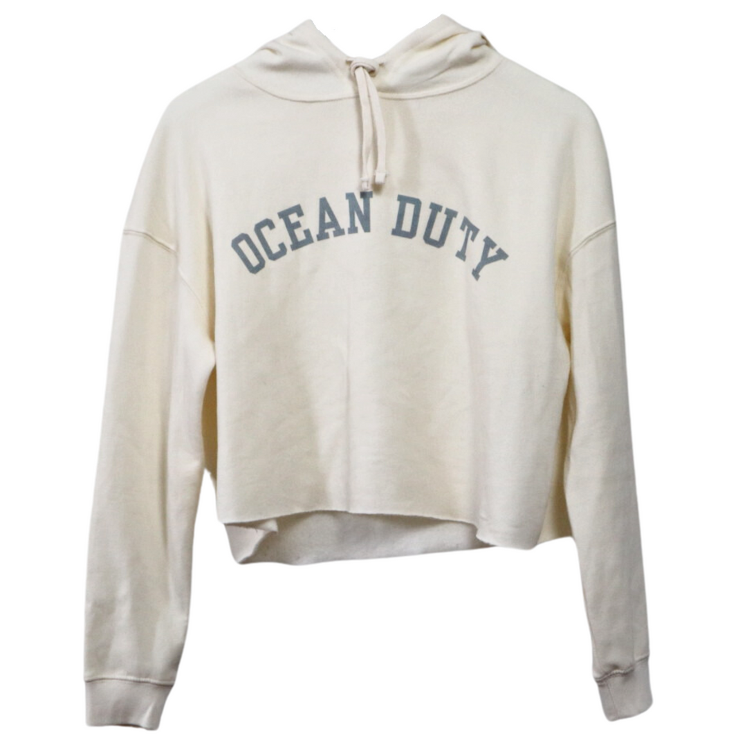 A cropped bone white hoodie with ocean duty text and a gorgeous mermaid graphic.