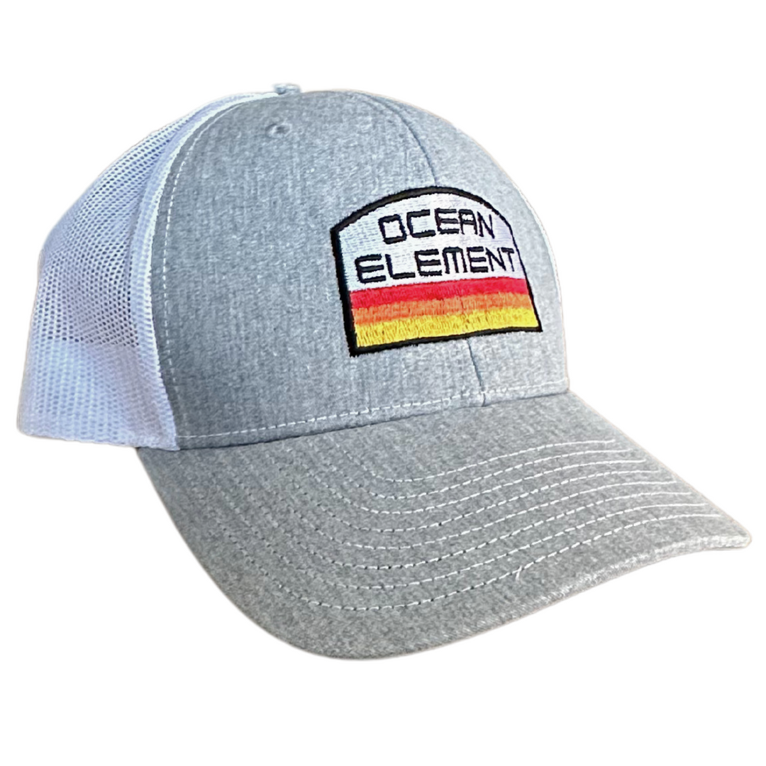 White and heather grey trucker hat called ocean element with colorful ocean text and graphic embroidery.