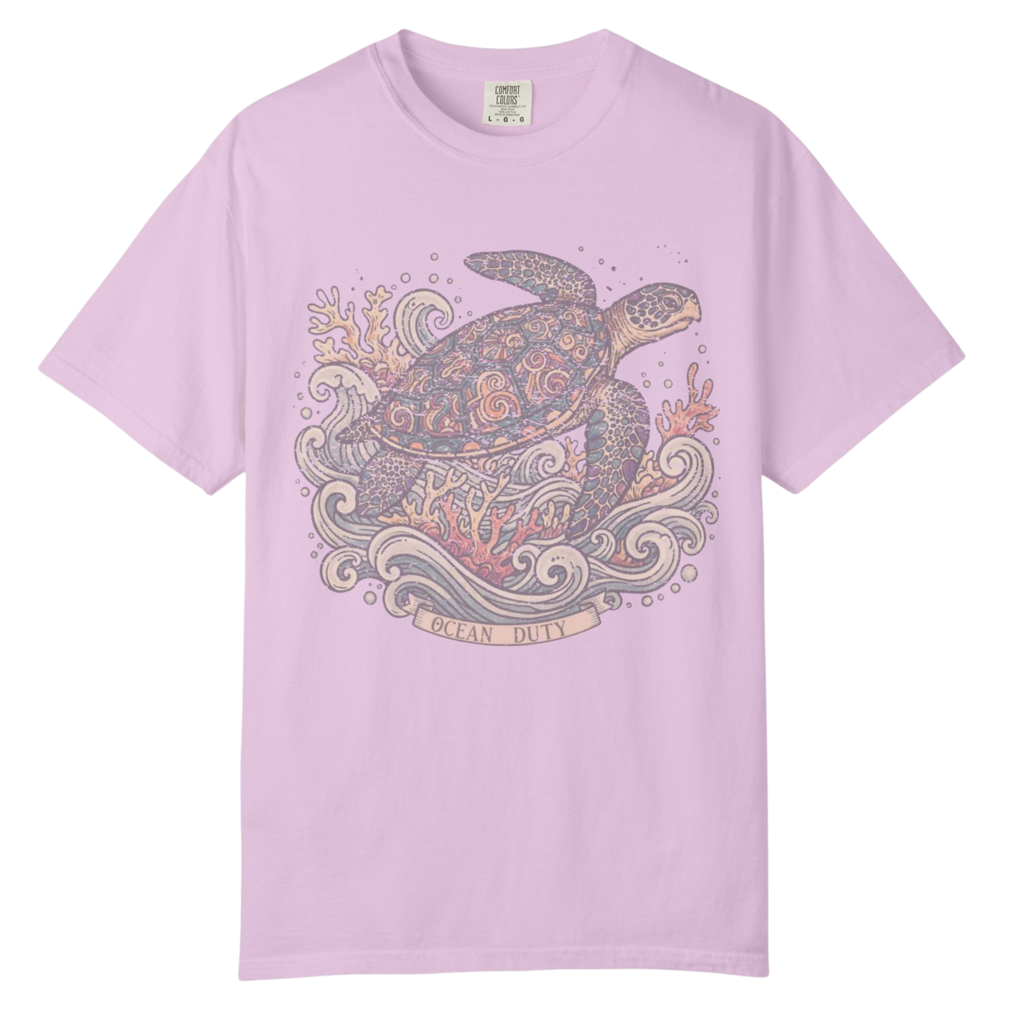 A light purple short-sleeve t-shirt with a detailed graphic of a sea turtle swimming through ocean waves, featuring a banner that reads 'OCEAN LIFE'.